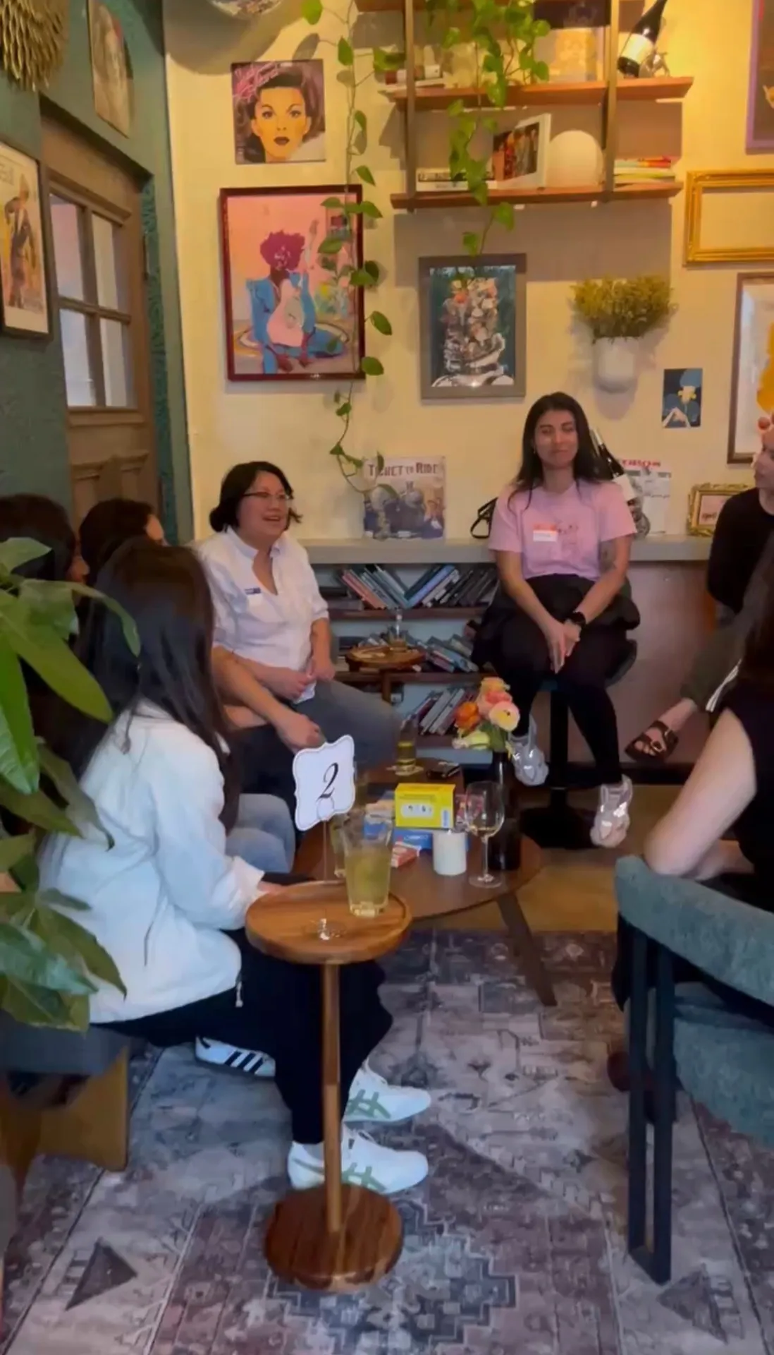 Friends chatting at cozy café meetup