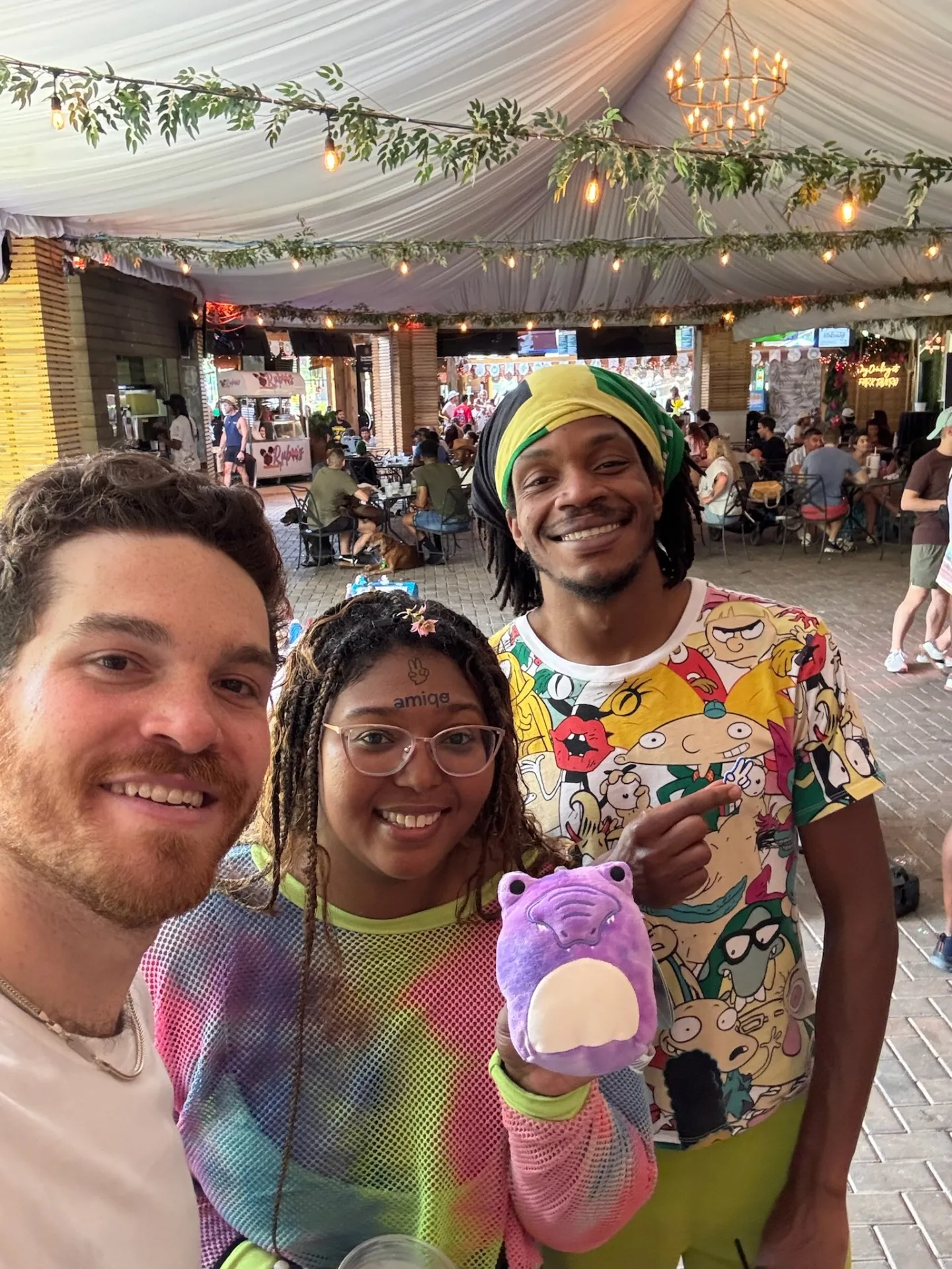 Three friends selfie at night market