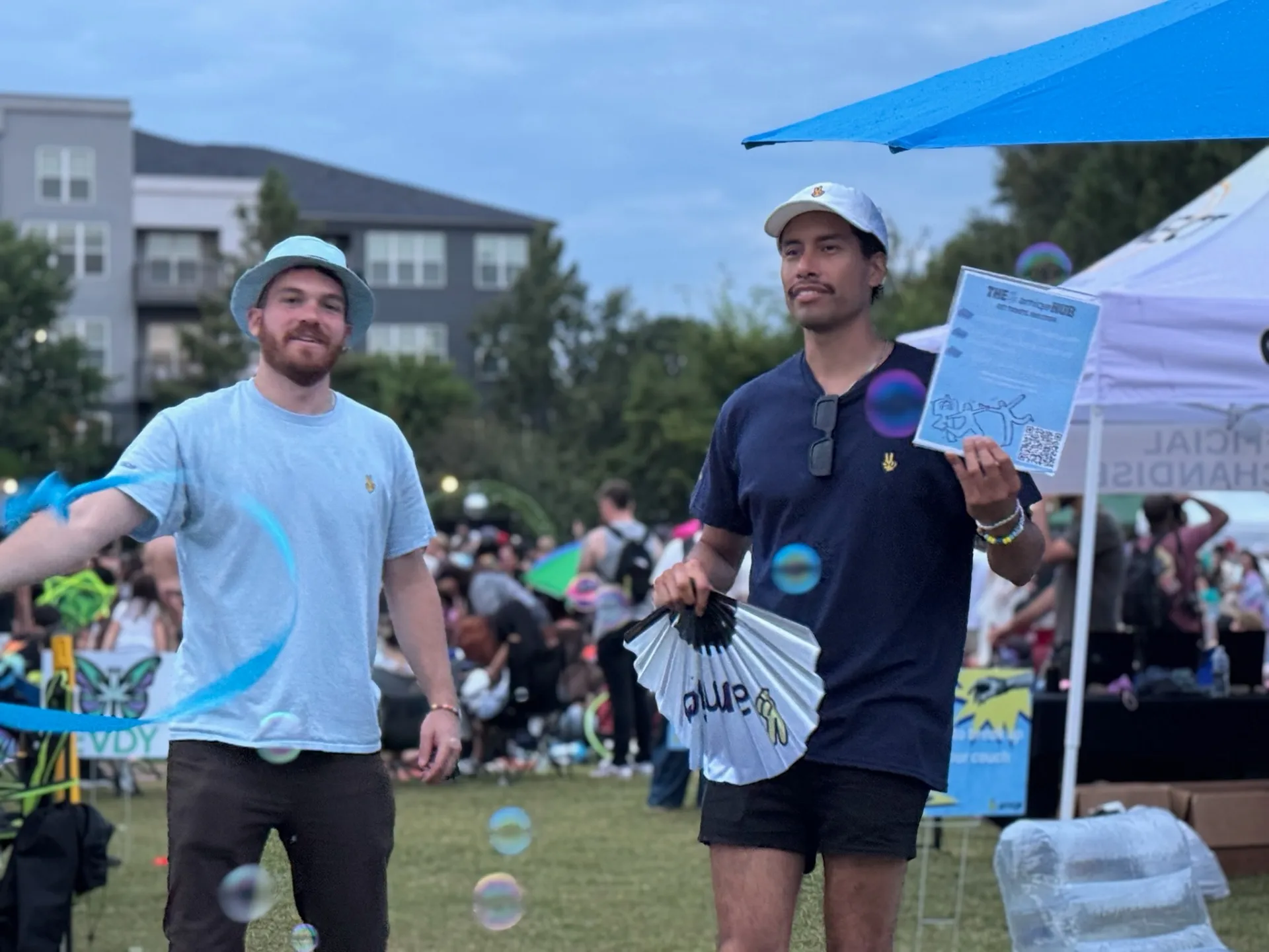 amiqo team with flyers and bubbles